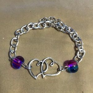 Silver bracelet with hearts and multicolored beads